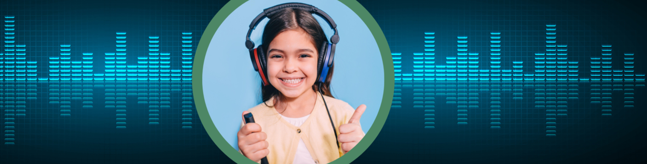 A girl smiling wearing hearing testing headphones